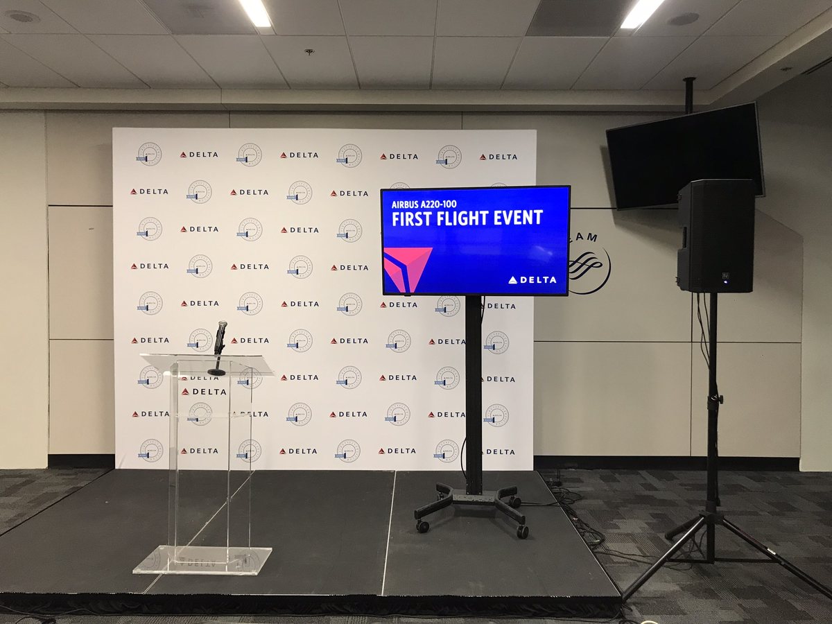 A gooseneck podium microphone rung out for an award ceremony at a Fort Worth corporate event