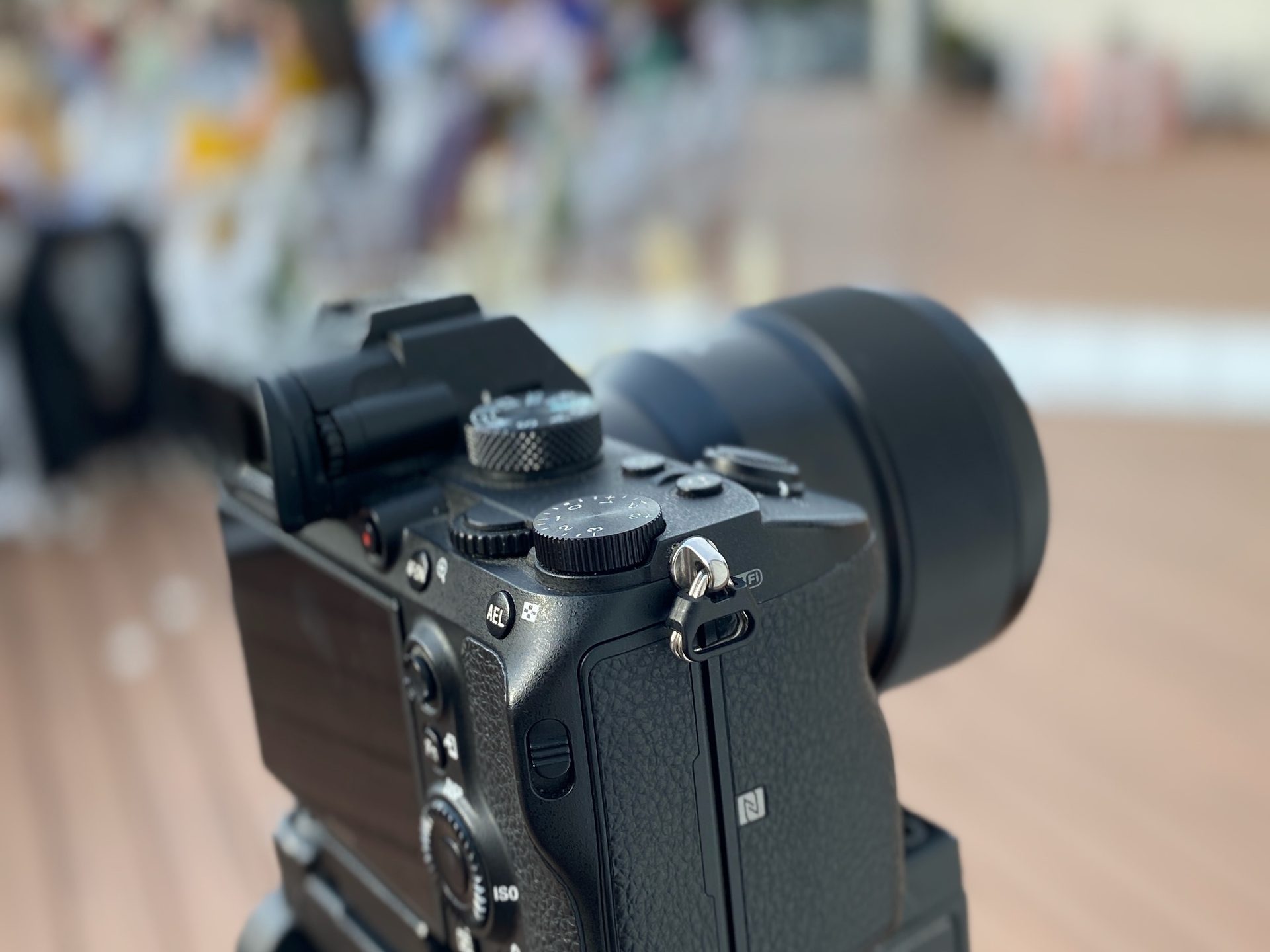 A Sony camera on a tripod aimed at an outdoor DFW event